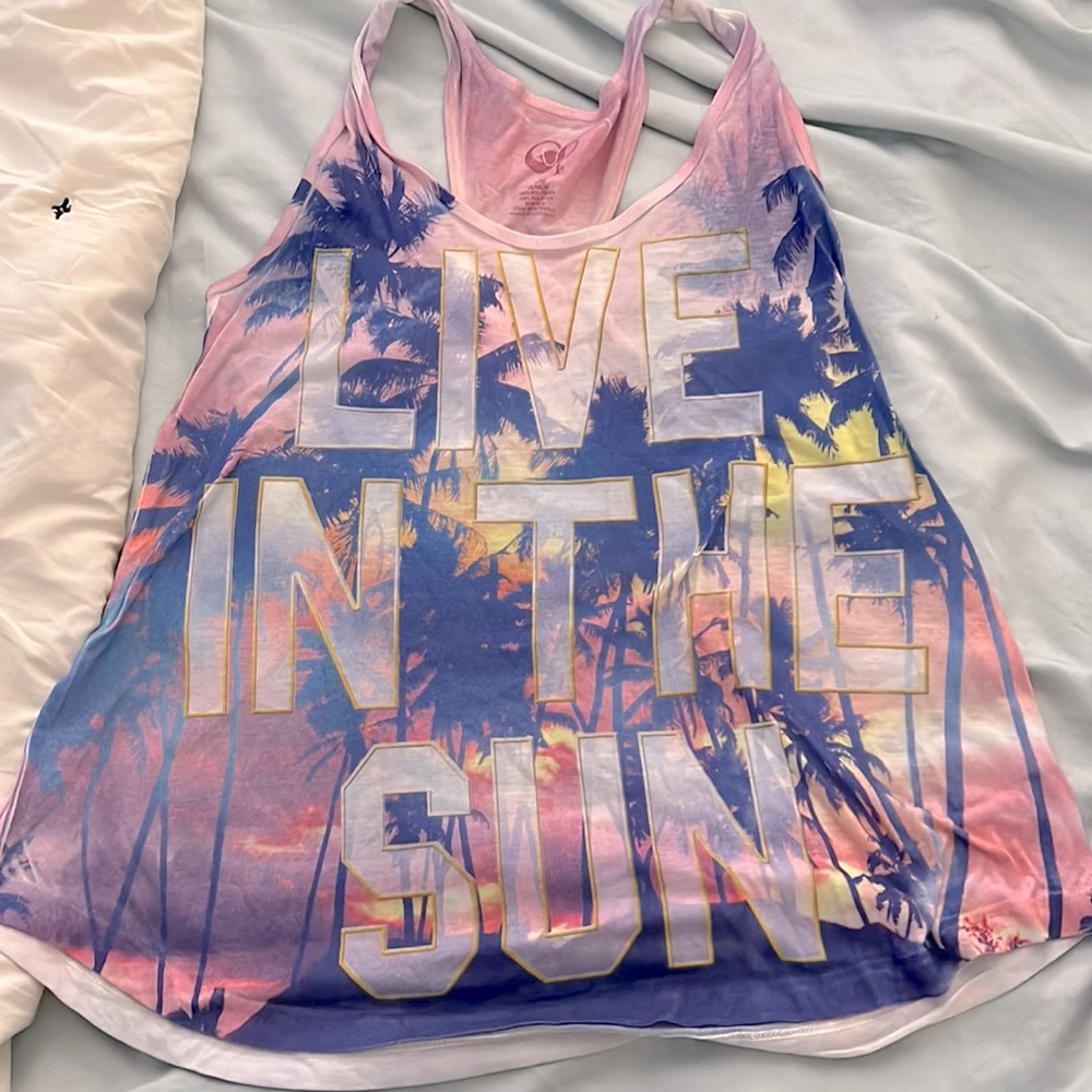 Fun designed tank top, size large warm a few times